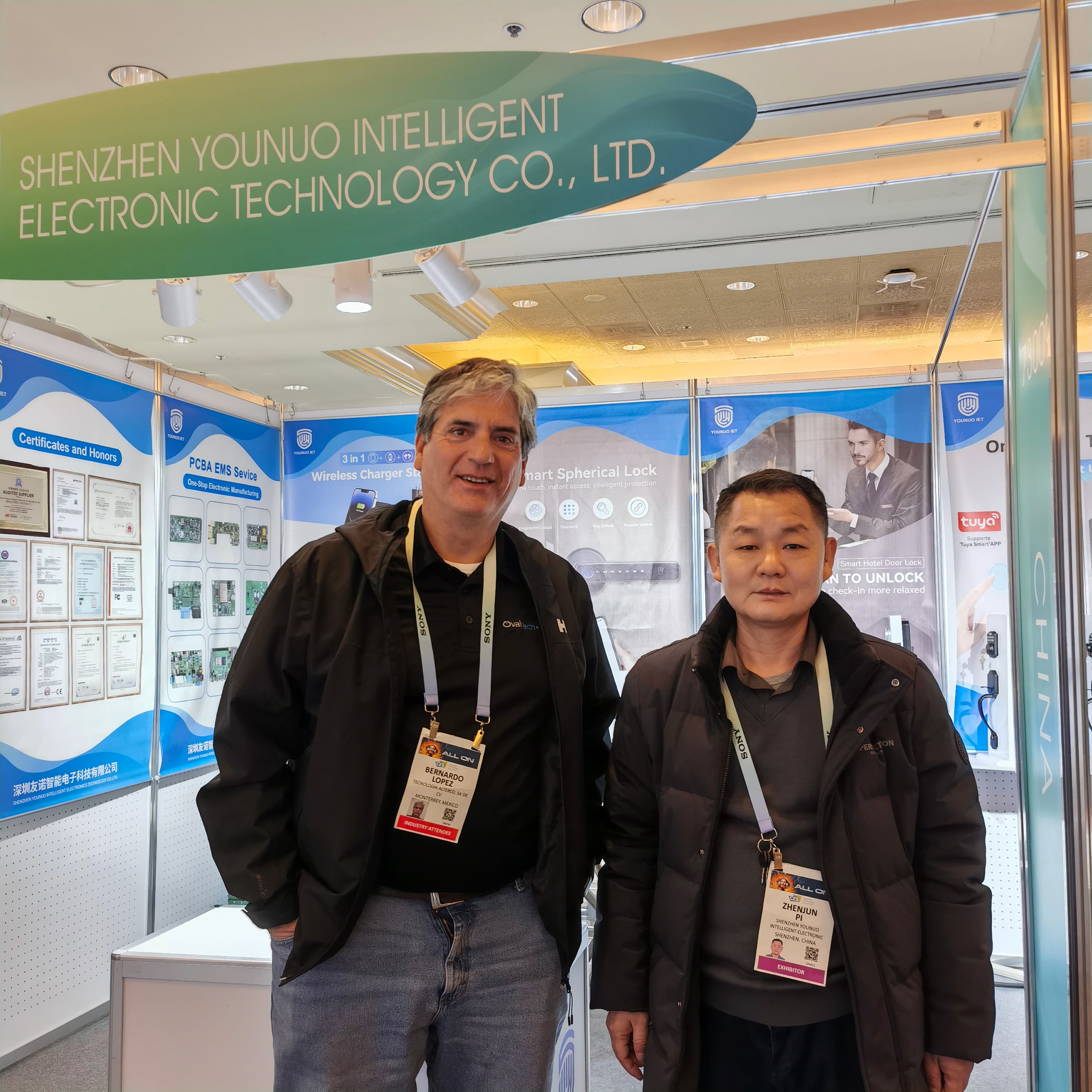 YOUNUO IET meeting an international visitor at its CES 2024 smart lock exhibition booth in Las Vegas